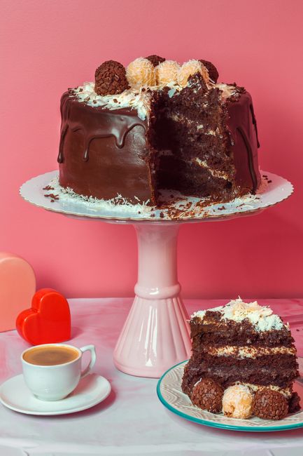 Indulge in a rich chocolate cake with fluffy cream, perfect for any sweet occasion.