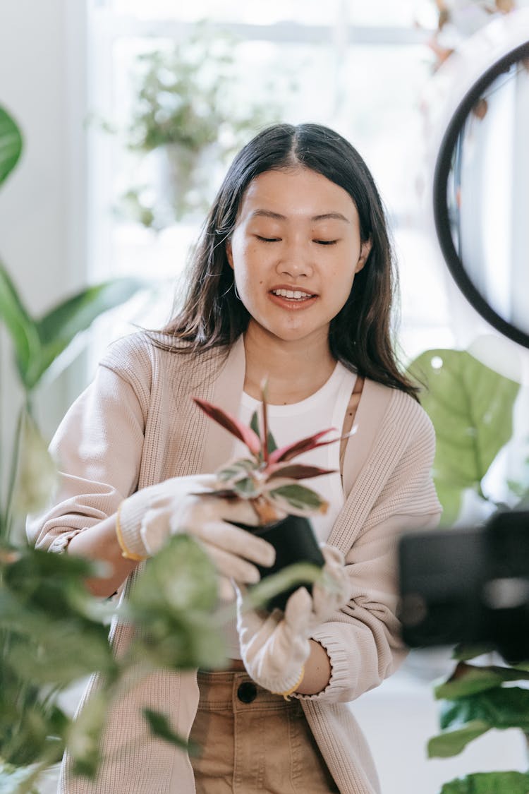 A Woman Gardening Activity At Home