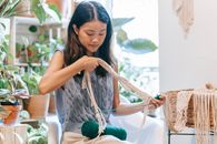Woman holding a Crochet