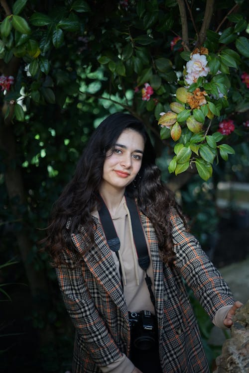 Beautiful Woman wearing Plaid Coat