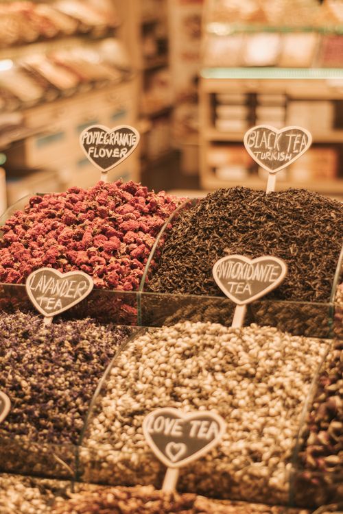 Free A variety of loose herbal teas on display in a market, featuring pomegranate flower, black tea, and more. Stock Photo