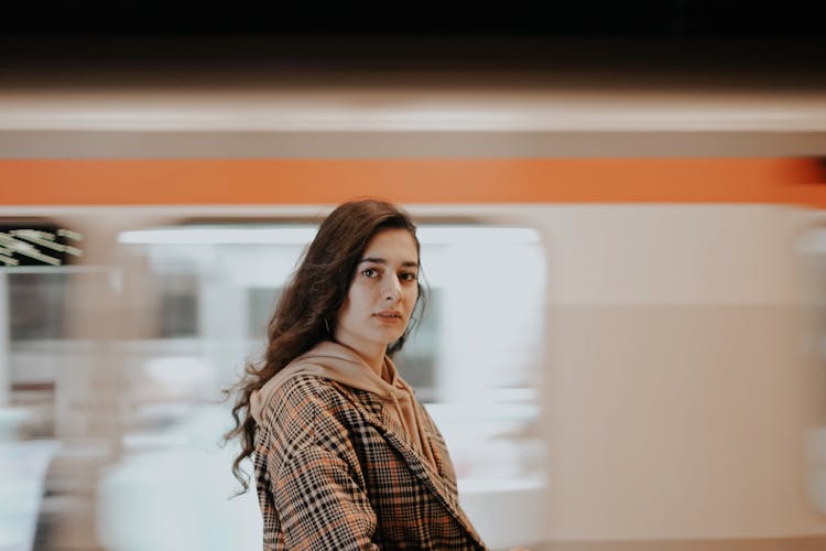 Woman And Train Behind