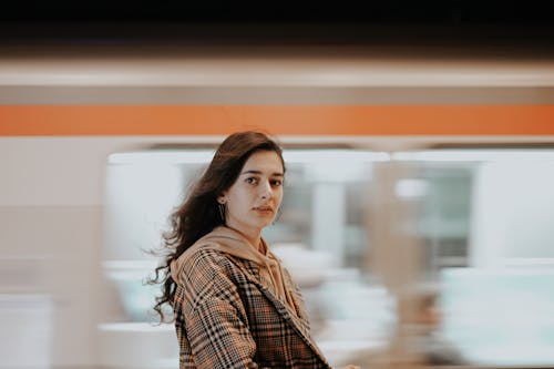 Beautiful Woman wearing Plaid Coat