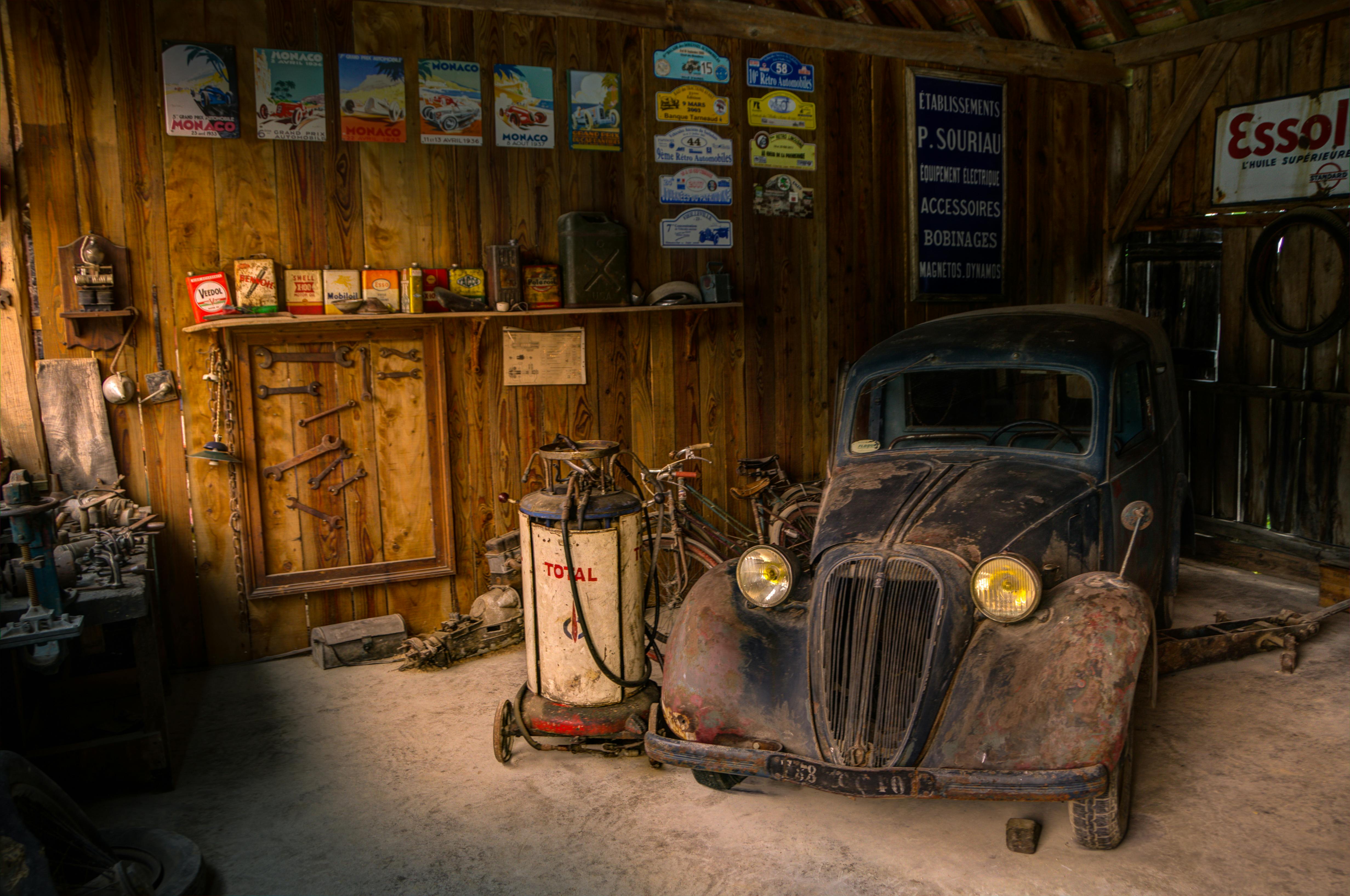 Classic Brown Vehicle Parked Beside Trees · Free Stock Photo