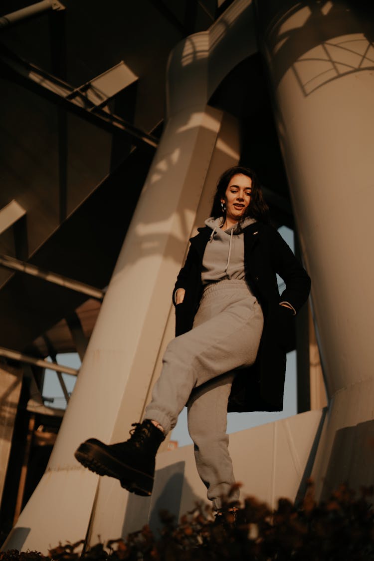 Low Angle Shot Of A Woman In Sweats