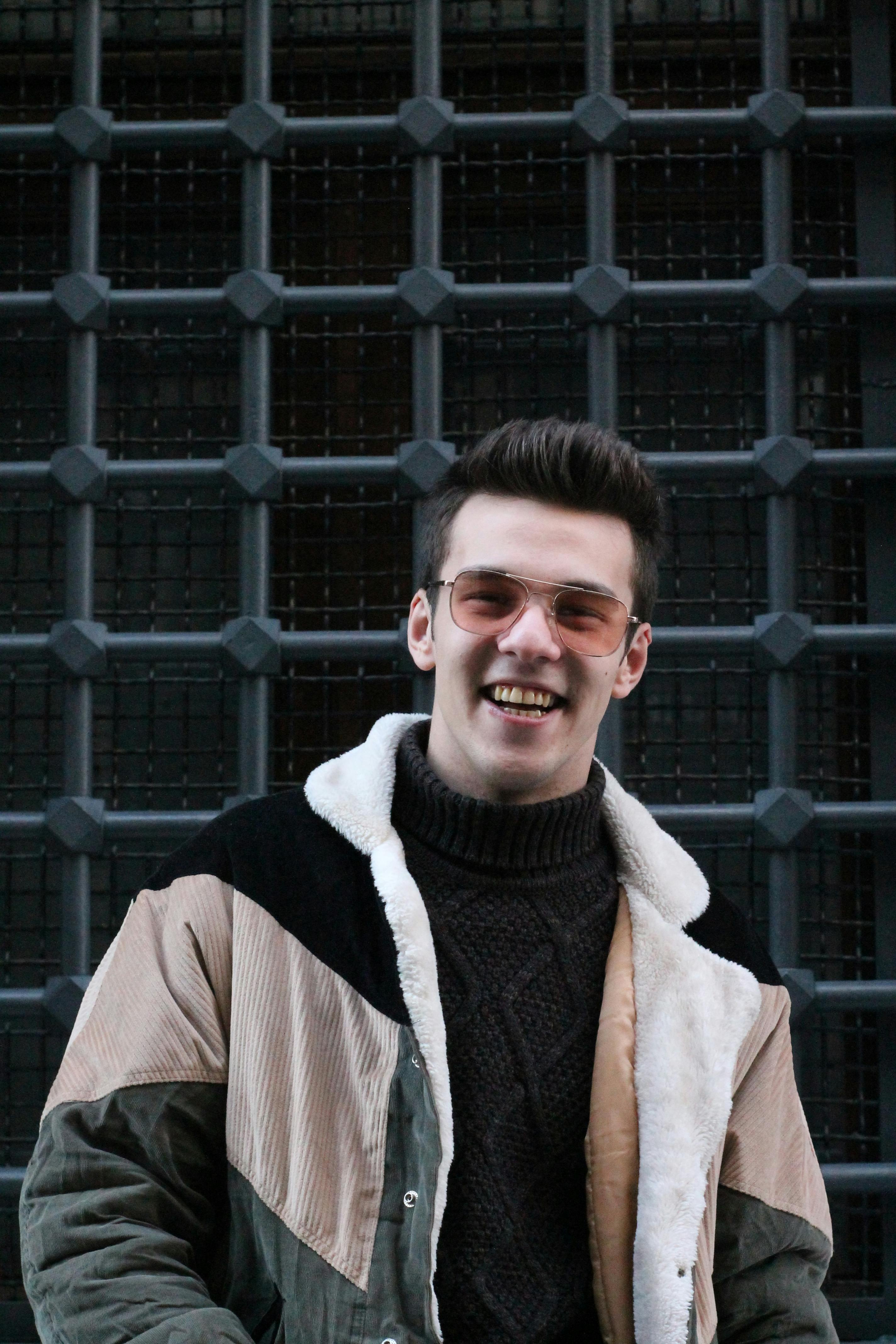 Fine Looking Man in Black Knitted Sweater with Jacket and Sunglasses