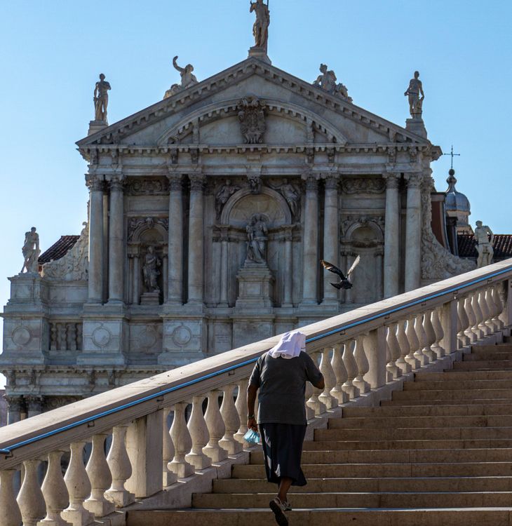 Back View of a Person Walking on Stairs · Free Stock Photo
