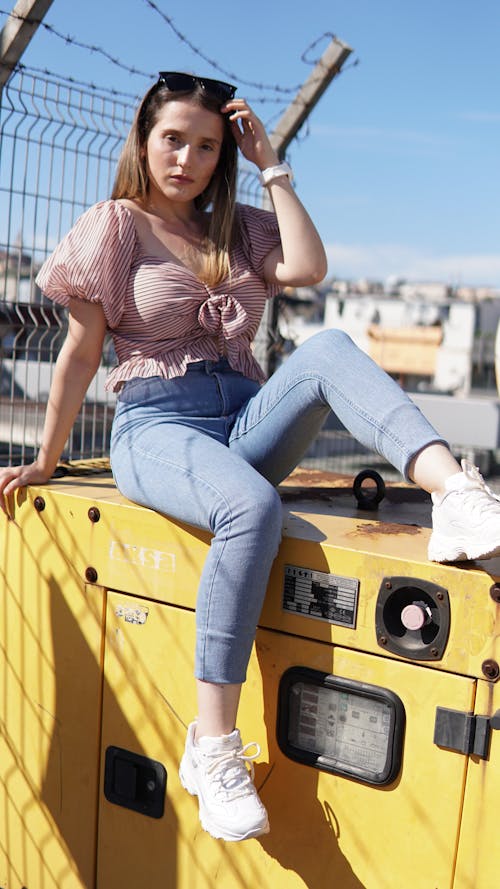 Pretty Woman Wearing Stripe Blouse Posing