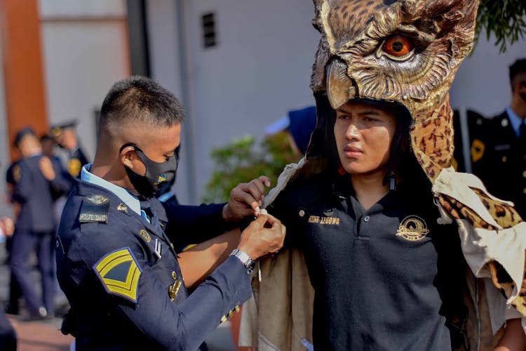 Man Wearing An Owl Costume 