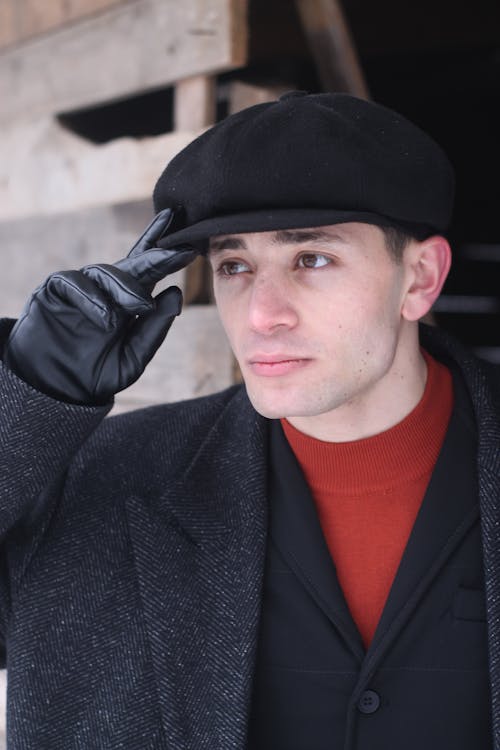 Portrait of a Man Wearing a Black Beret Hat