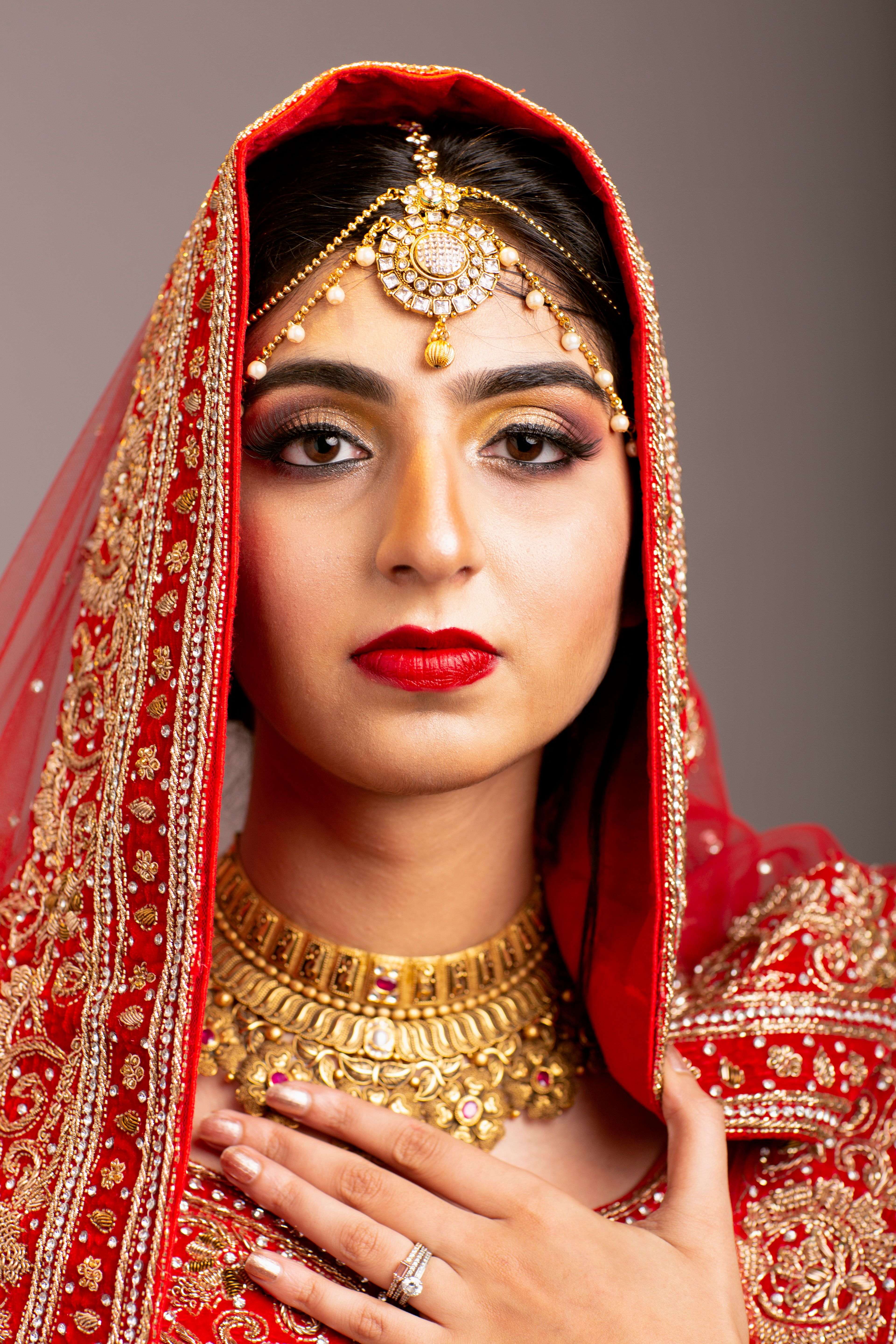 Woman in Red and Gold Hijab · Free Stock Photo