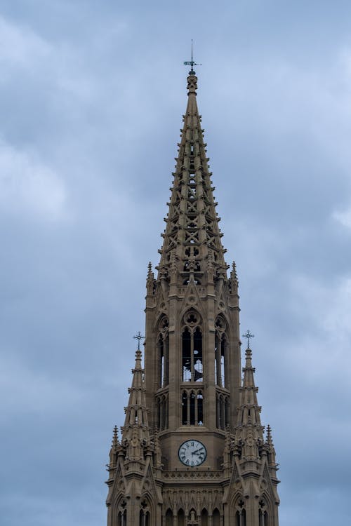 Бесплатное стоковое фото с башня, вертикальный выстрел, голубое небо
