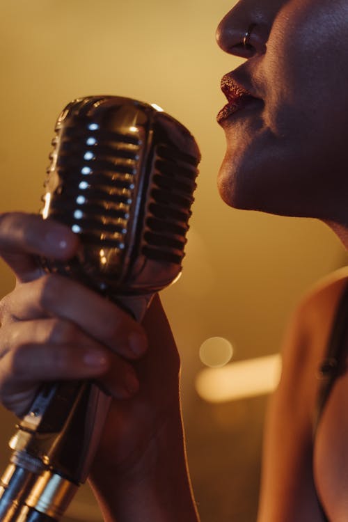 Free Close-Up Shot of Person Singing Stock Photo