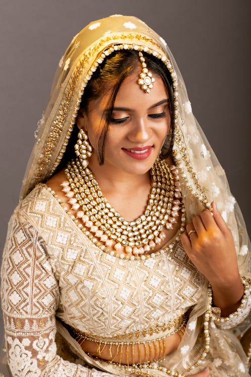 Free Photograph of a Woman Wearing Bridal Jewelry Stock Photo