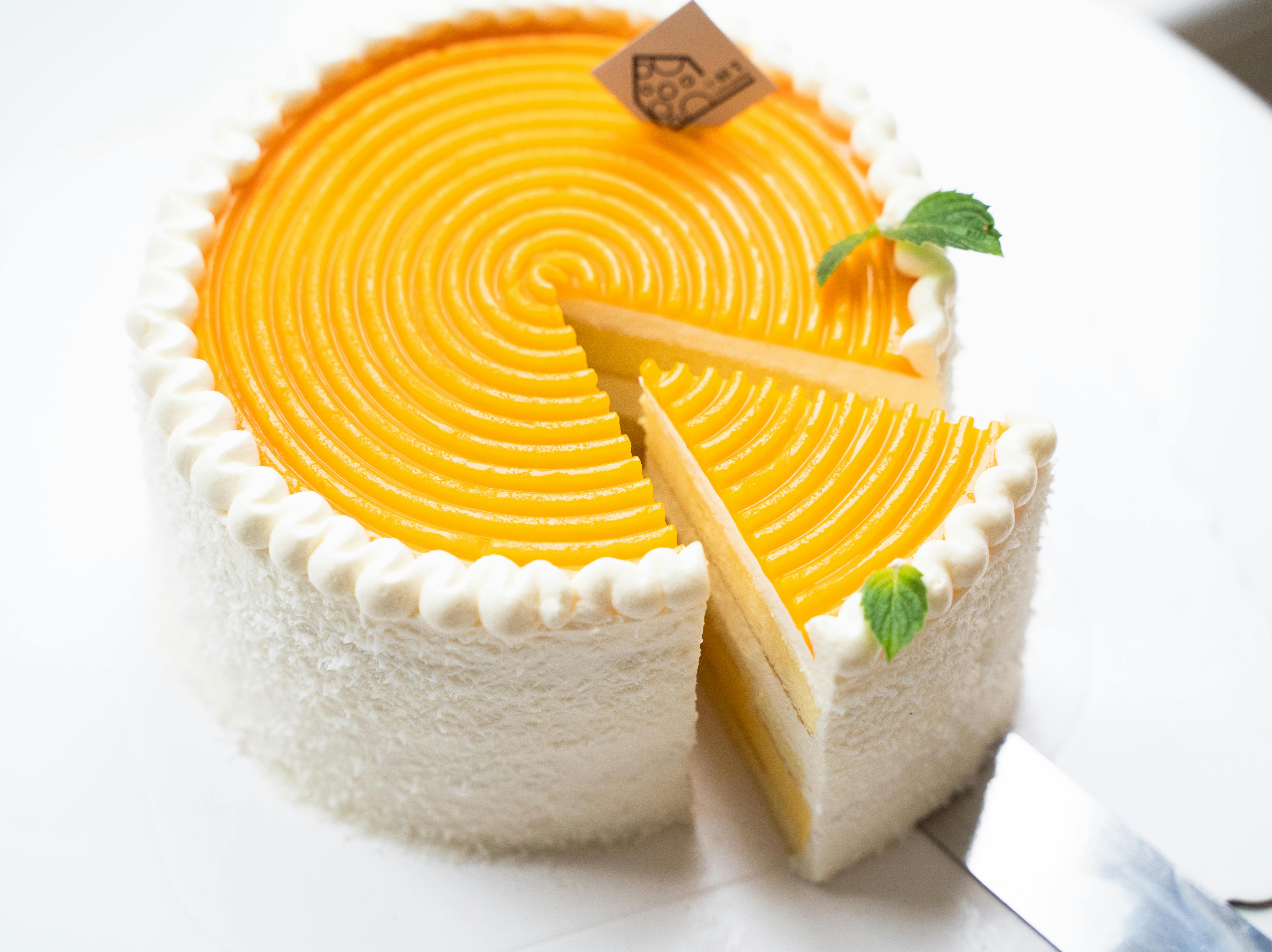 Mango Cake with One slice cut