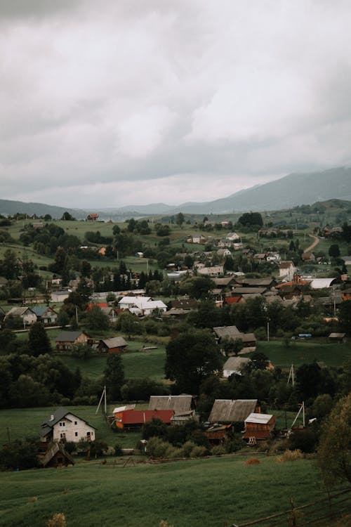 Mountain Village under Gloomy Sky