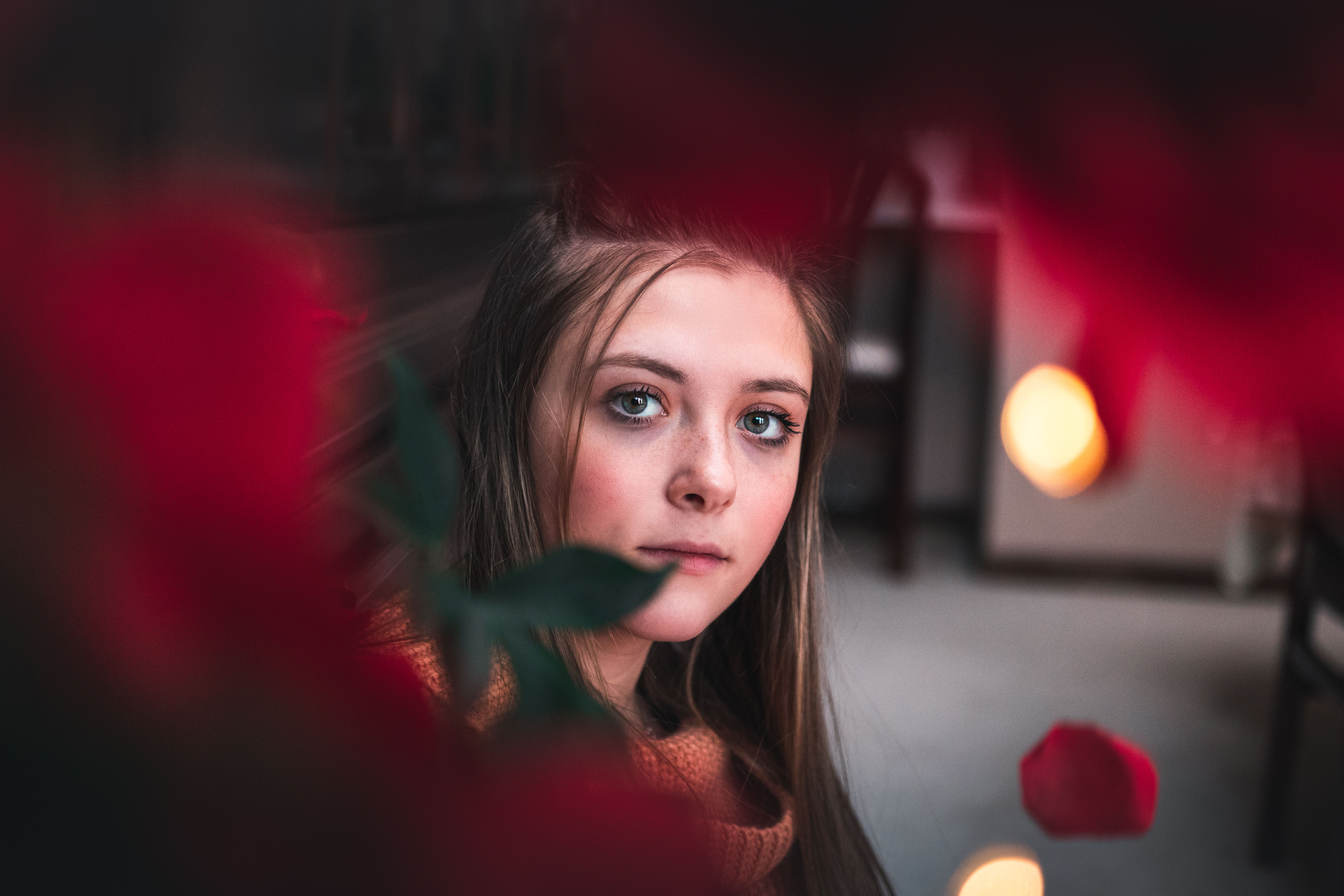 Woman in boudoir, soft light, neutral background
