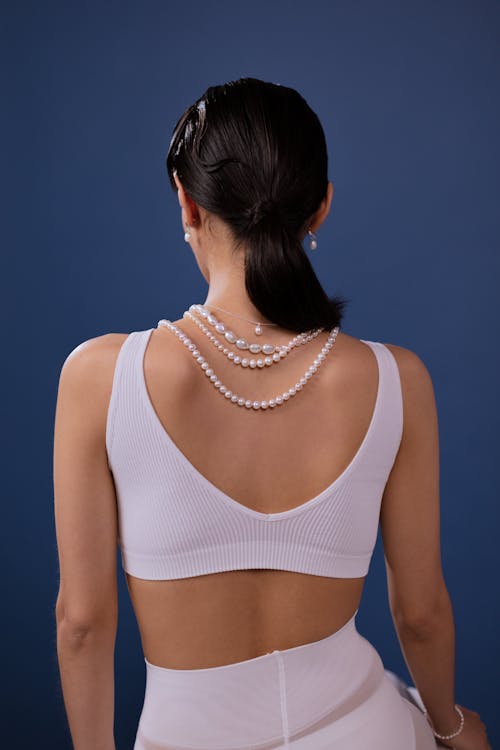Back View of a Woman Wearing Pearl Necklaces