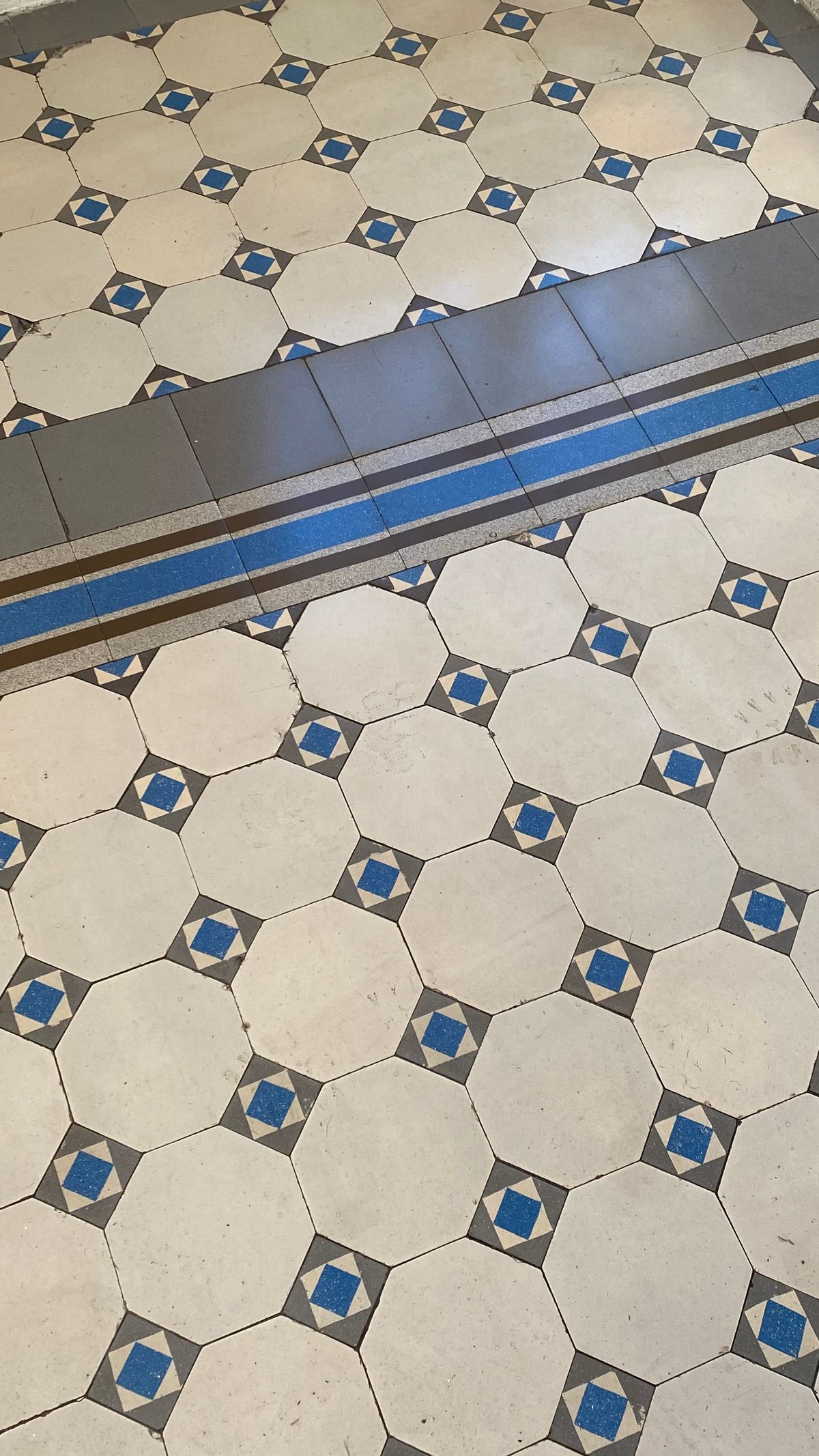 Clean tile floor with visible grout lines