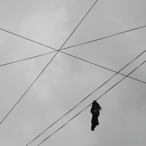 Black Textile Hanging on Wire