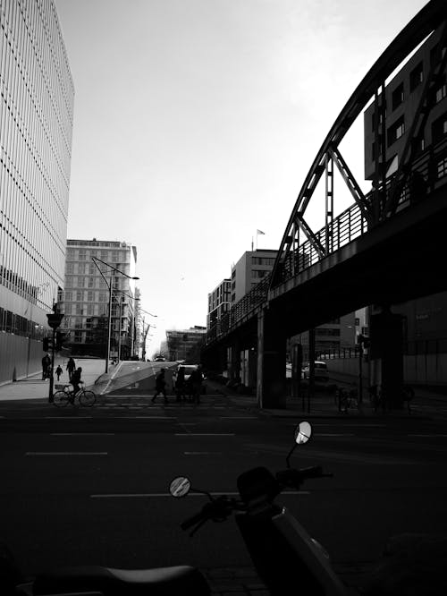 Grayscale Photo of People Walking on City Street