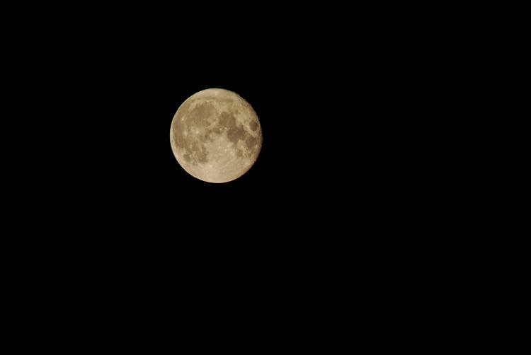 Full Moon On Dark Sky