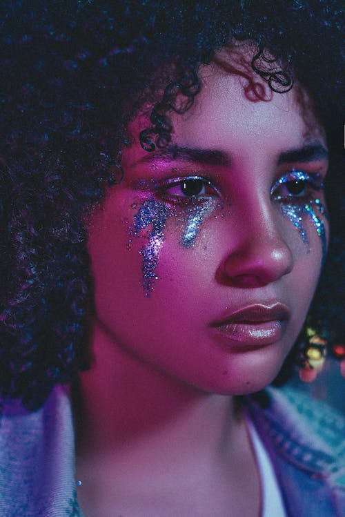 Woman with Blue Glitter Eye Makeup