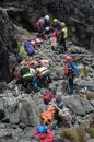 People Rescuing Injured  Person
