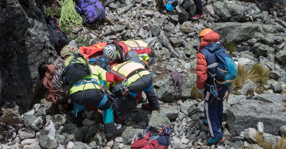 People Rescuing Injured Person · Free Stock Photo