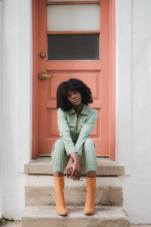 A Woman Sitting on the Stairs