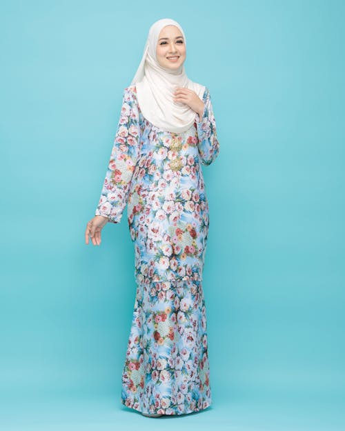 Woman in Floral Dress with White Hijab