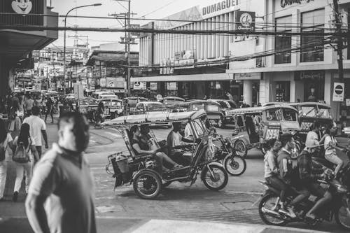 Grayscale Photo of Motorcycles and People