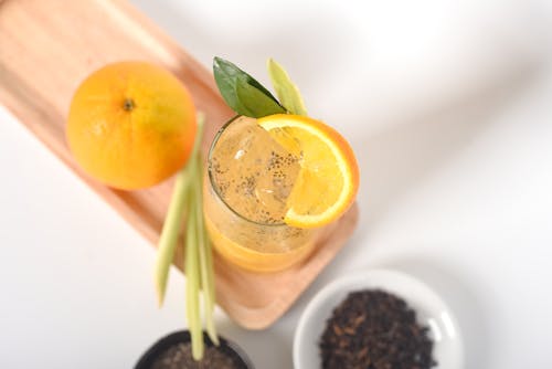 Free Shallow Focus of Orange Juice in Drinking Glass Stock Photo