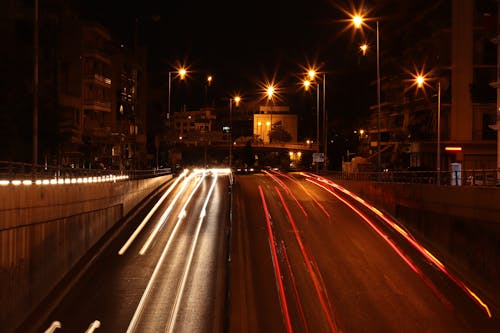 Free Time-Lapse Photography of Cars on Road during Night-Time Stock Photo