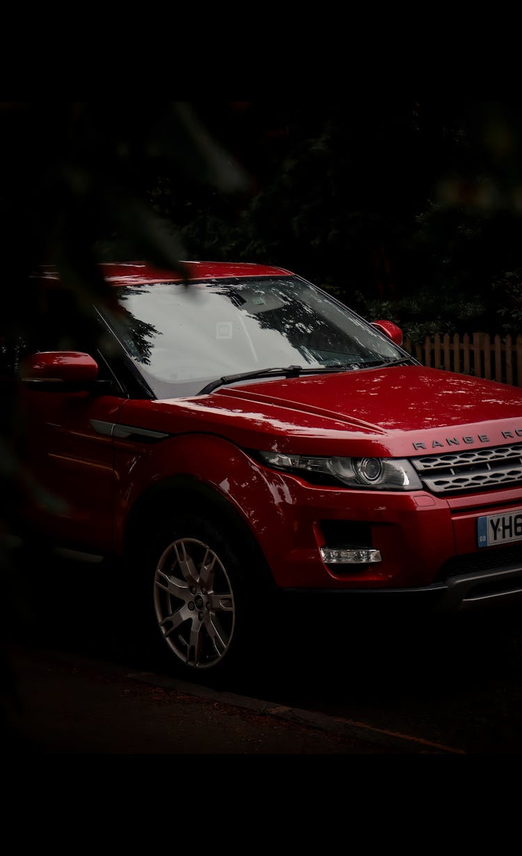 A Red Range Rover SUV