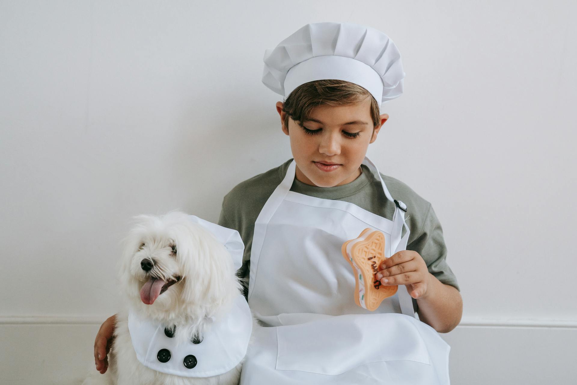 Child Sitting with a Dog