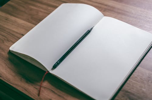 Opened Notebook with Blank Pages · Free Stock Photo