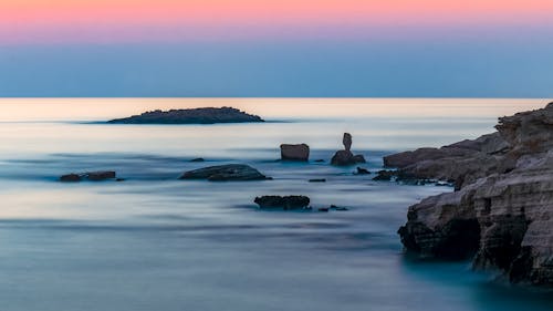 Free Long-exposure Photography of Ocean During Dawn Stock Photo
