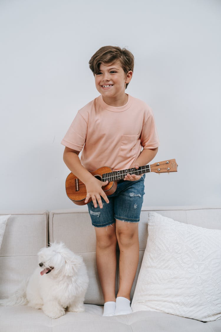 Boy With Guitar And Dog