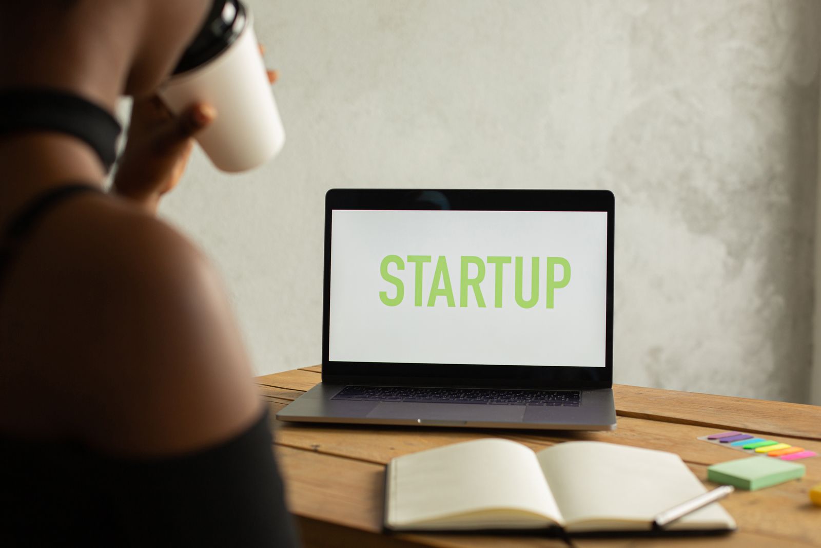 Startup website builder and laptop workspace