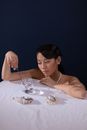 Woman in White Tank Top Holding Silver Fork