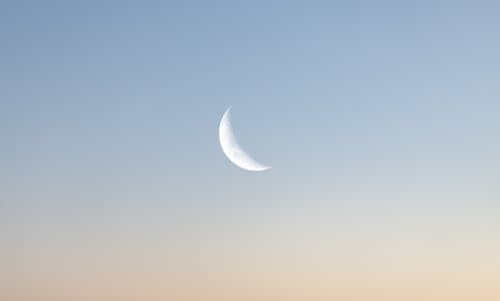 White Crescent Moon in the Sky