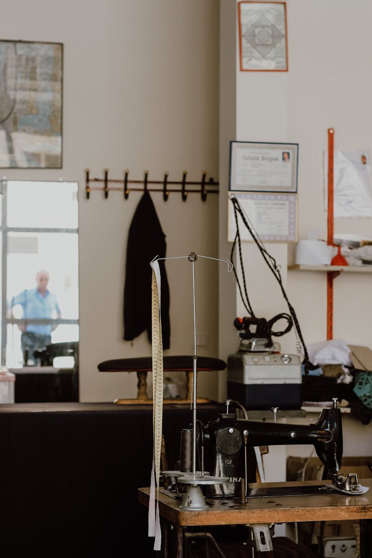 A Vintage Sewing Machine In A Dress Shop