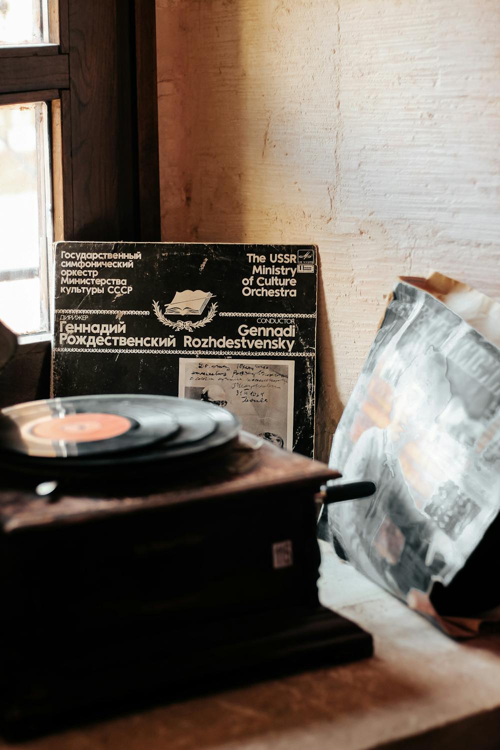Wooden Phonograph Beside Vinyl Records · Free Stock Photo