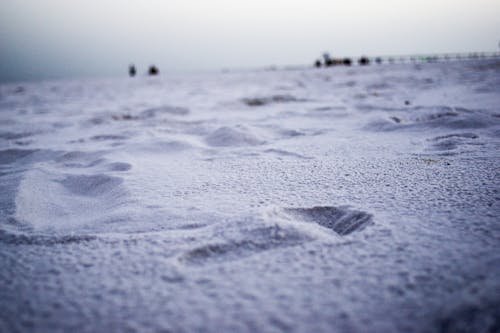 Foto profissional grátis de areia, pegada