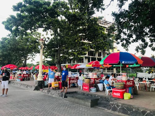 Fotos de stock gratuitas de calle, vendedores