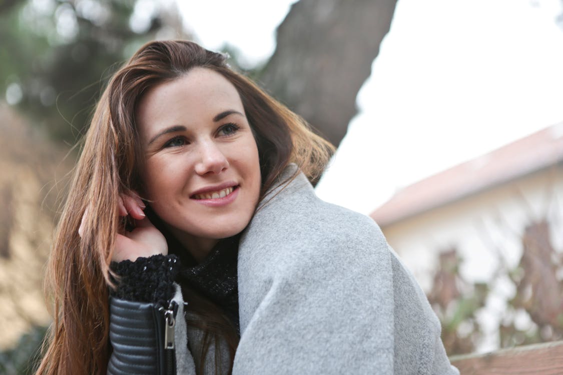 Free Woman Wearing Grey Zip-up Jacket Stock Photo