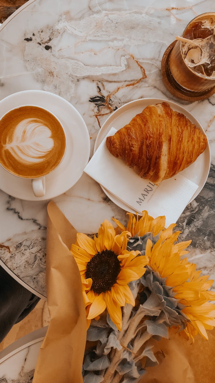 Coffee And Bouquet And Pastry