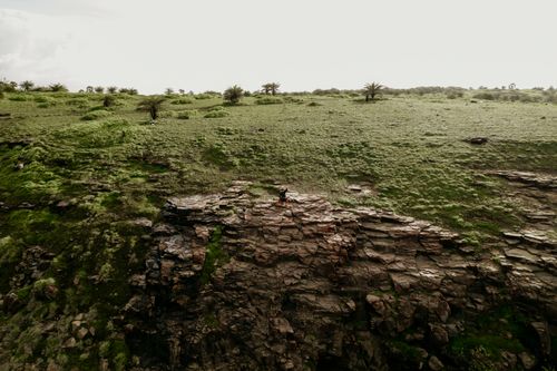 Free A stunning view of a green landscape and cliff near Mumbai, showcasing the natural beauty and rugged terrain of the area. Stock Photo