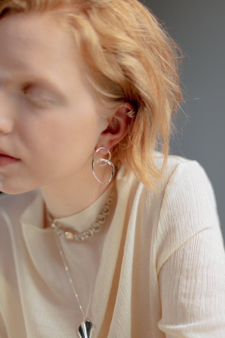 Woman Wearing Silver Earring